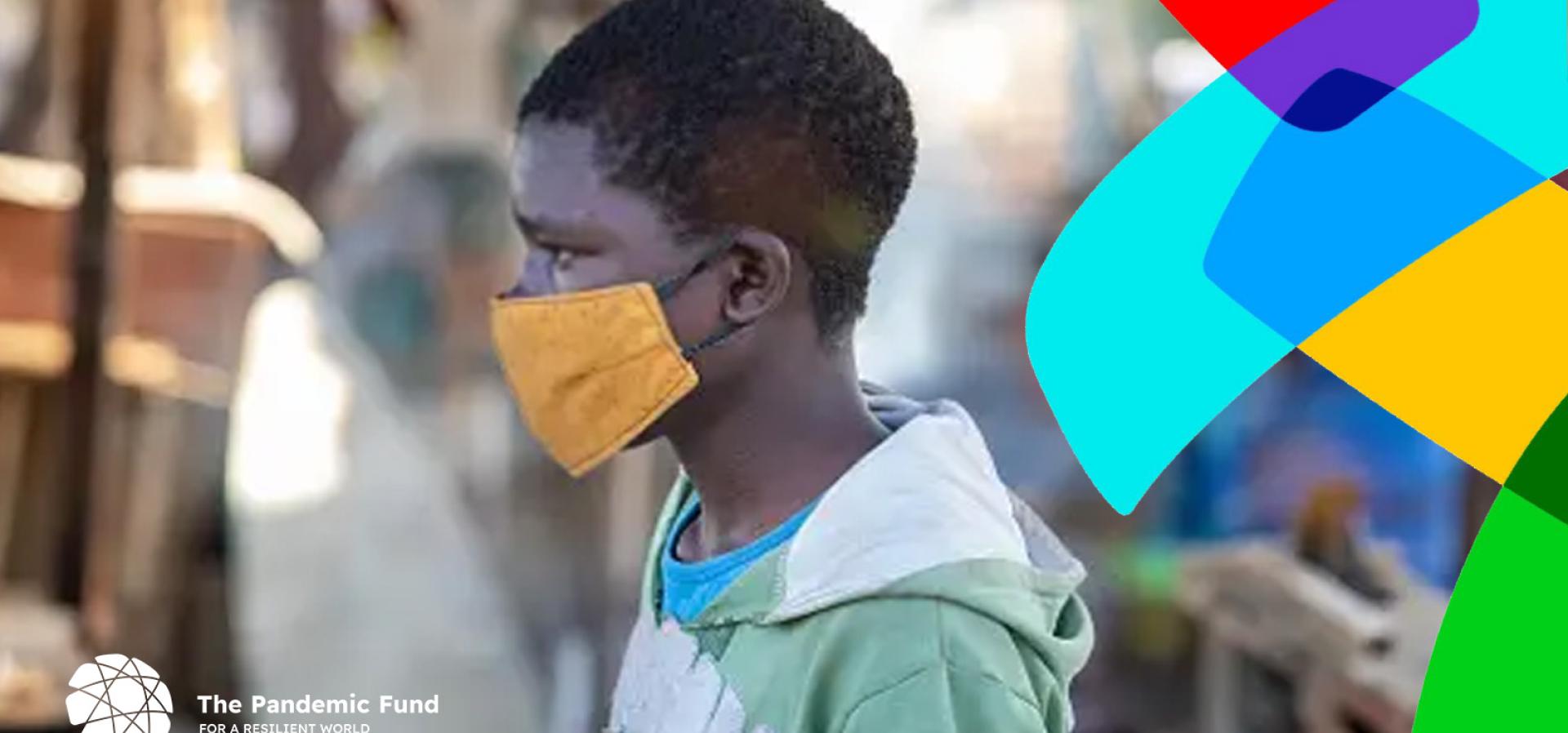 Boy stares to the left, pandemic fund logo overlay